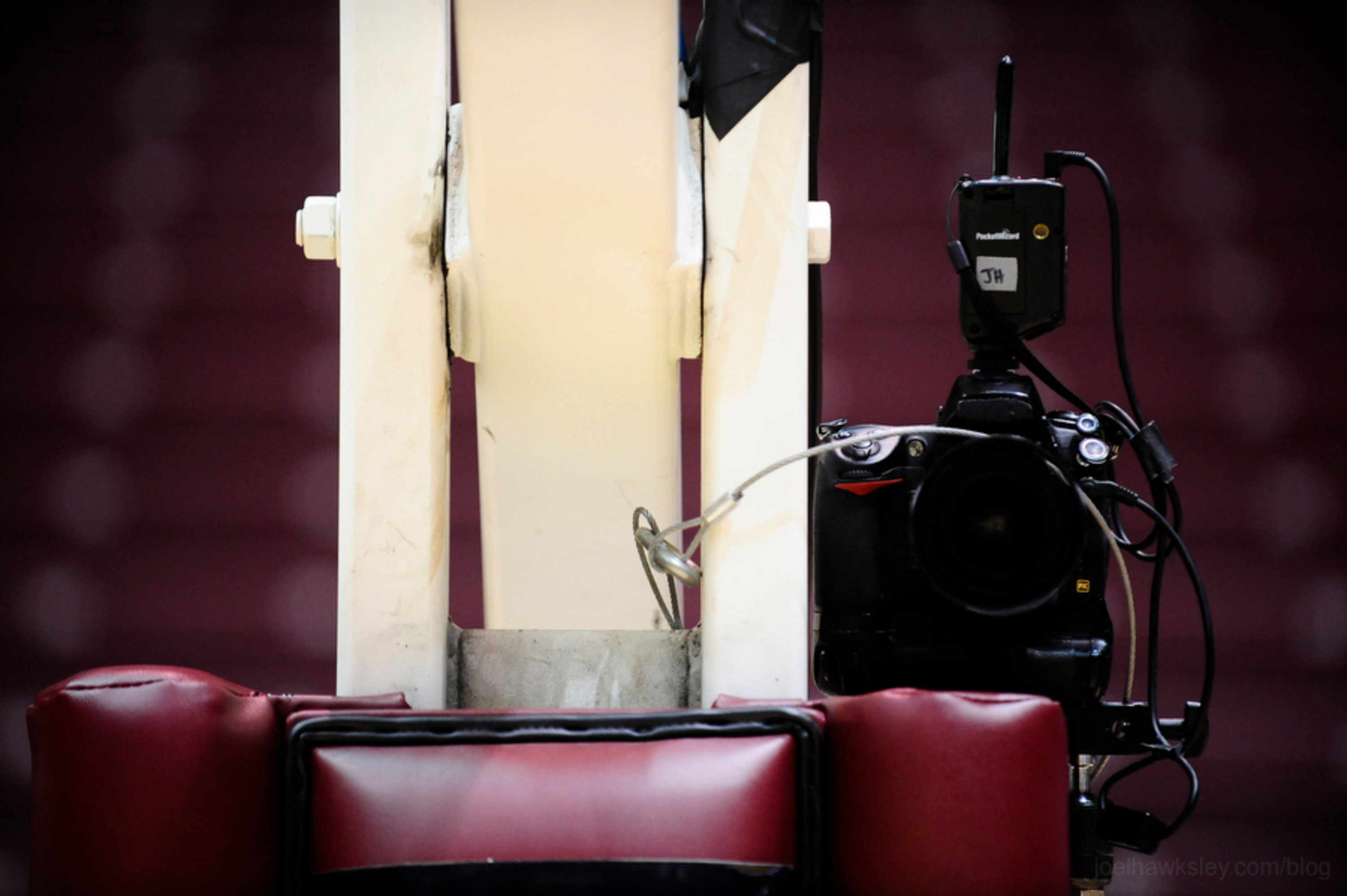 Nikon camera mounted to the post of a basketball hoop