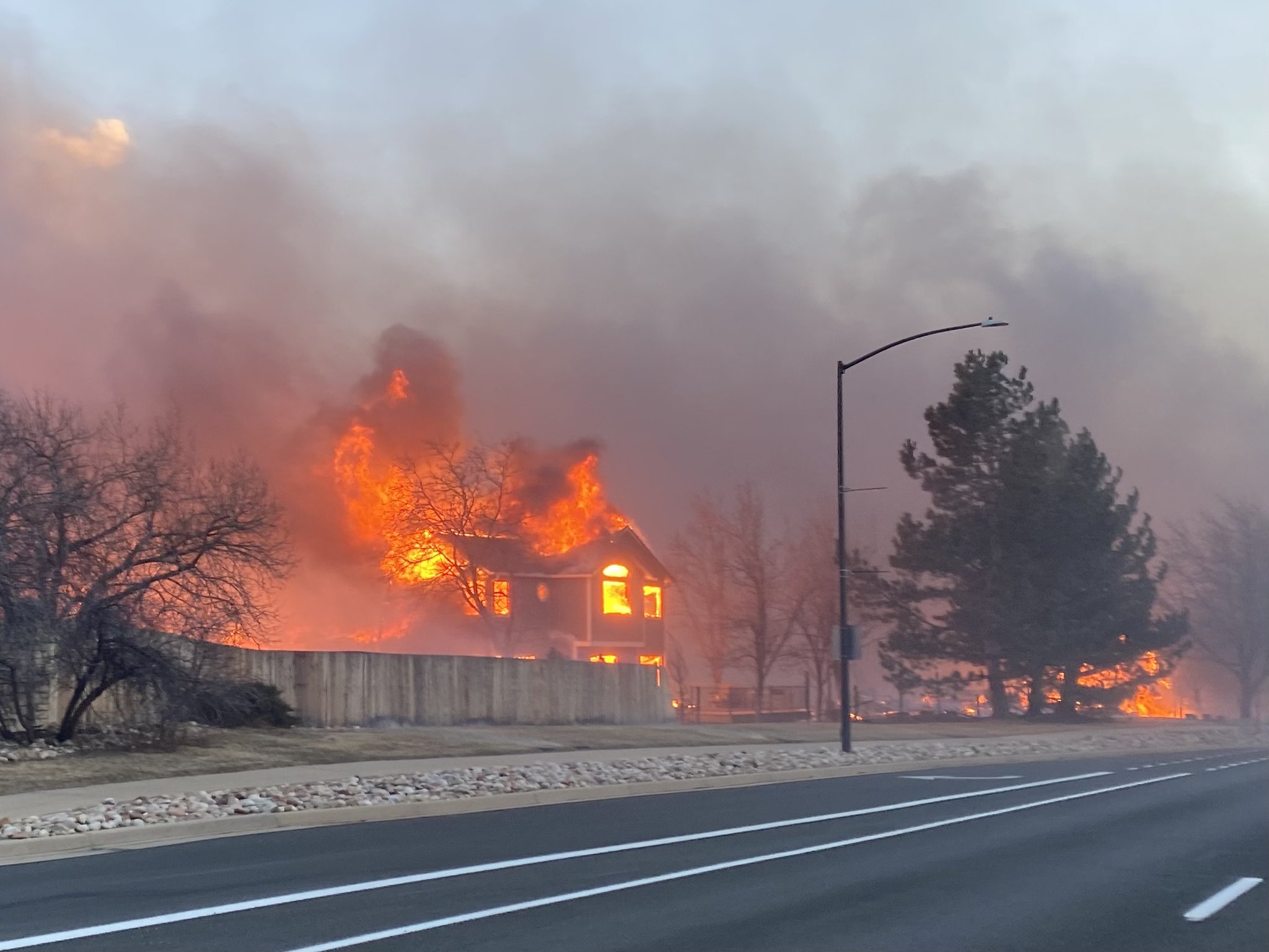 A house fully engulfed in flames