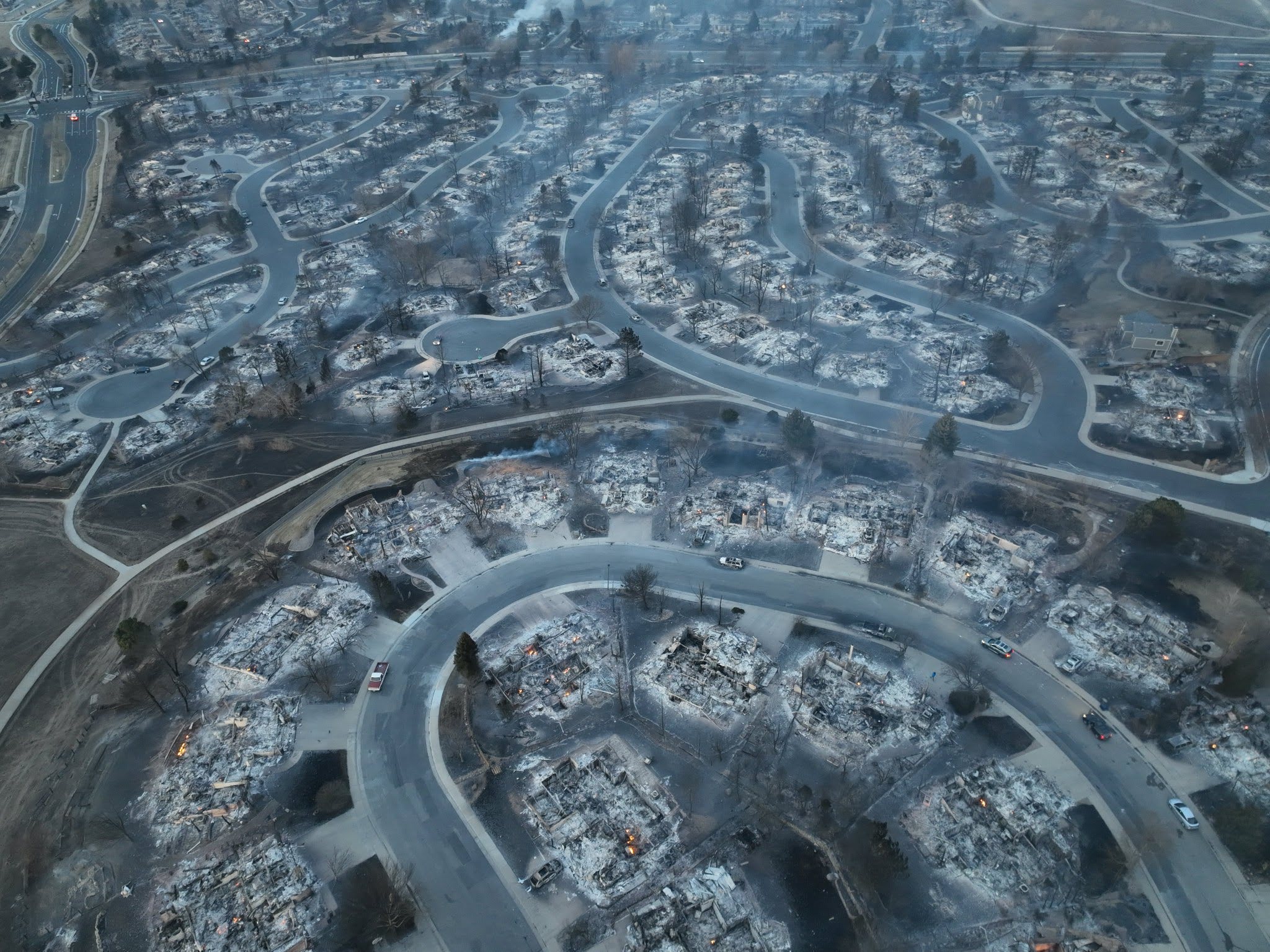 Aerial photo of hundreds of ash footprints taken before dawn